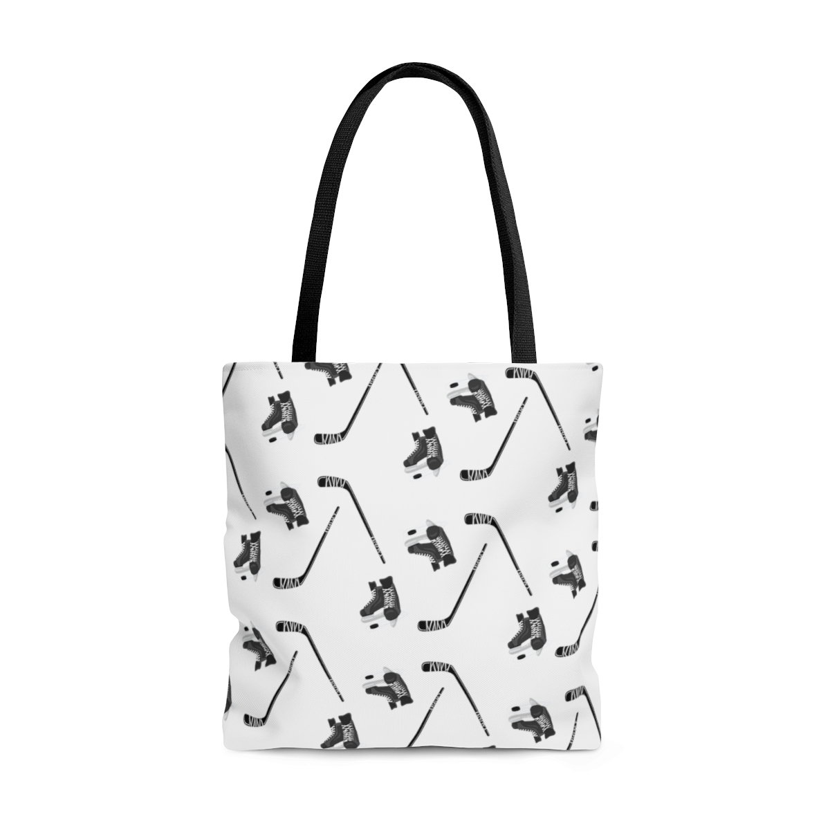 Image of a white canvas tote with a black handle. A hockey graphic print covers the tote. Hockey skates and sticks