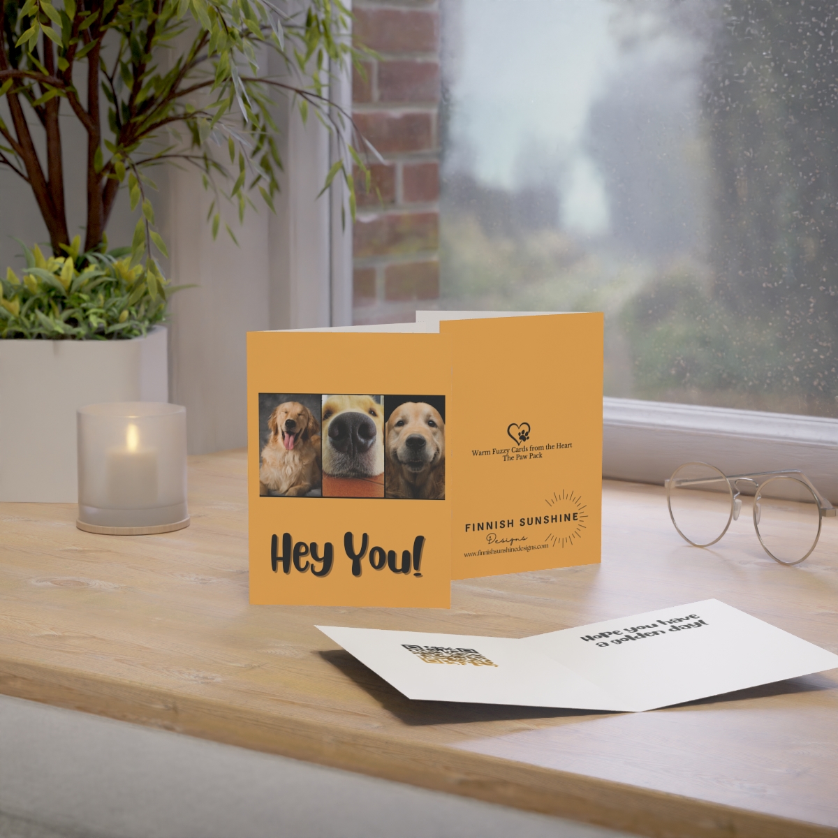 Image of the Hey You Golden retriever card dislayed showing the front, back and inside of the card on a desk